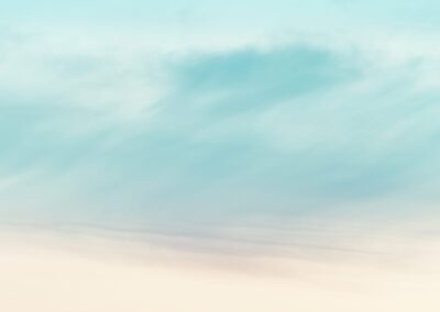 Vertical ratio size of sunset background. sky with soft and blur pastel colored clouds. gradient cloud on the beach resort. nature. sunrise. peaceful morning.